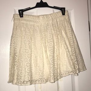 Cream colored above the knee skirt